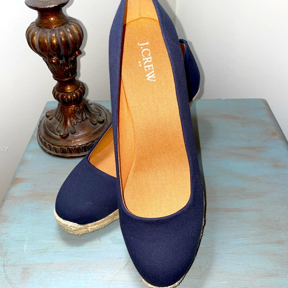JCrew wedge espadrilles in navy blue with woven rope detail.